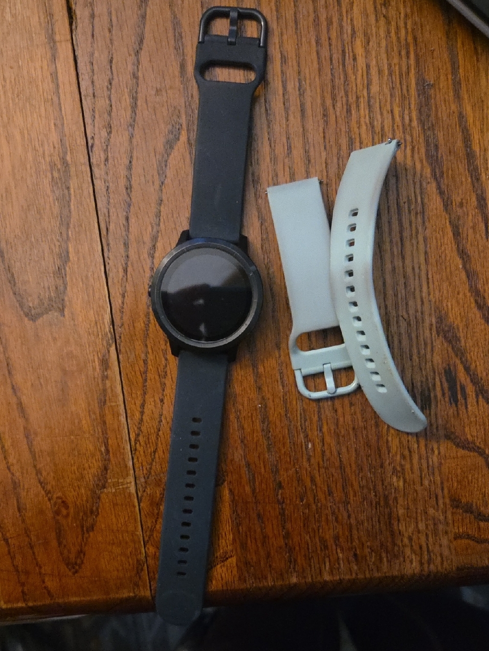garmin Black Smartwatch with Light Gray Replacement Bands